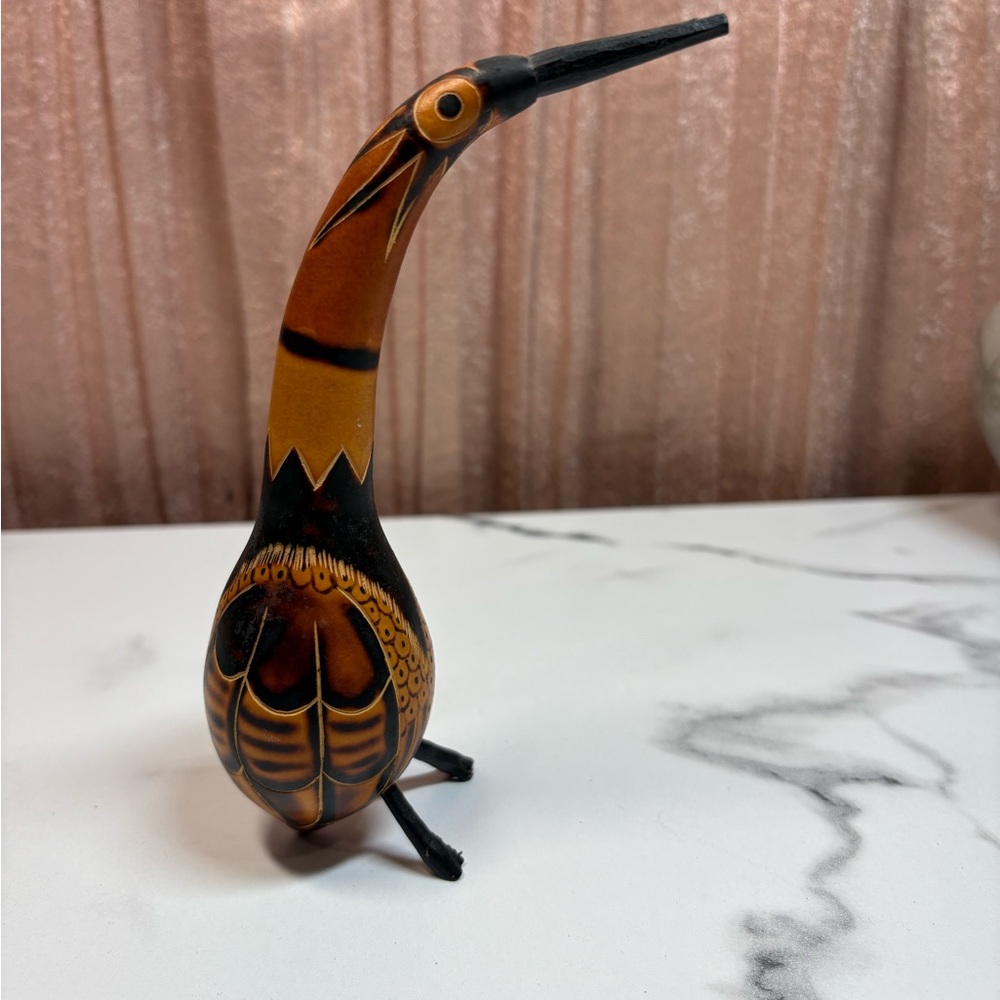 hand-carved and painted Peruvian gourd bird figurine